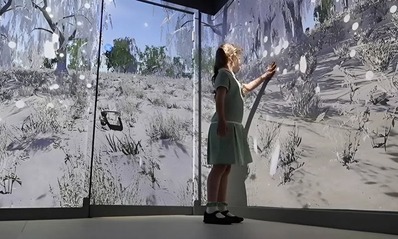 IR-girl-touching-desert-wall